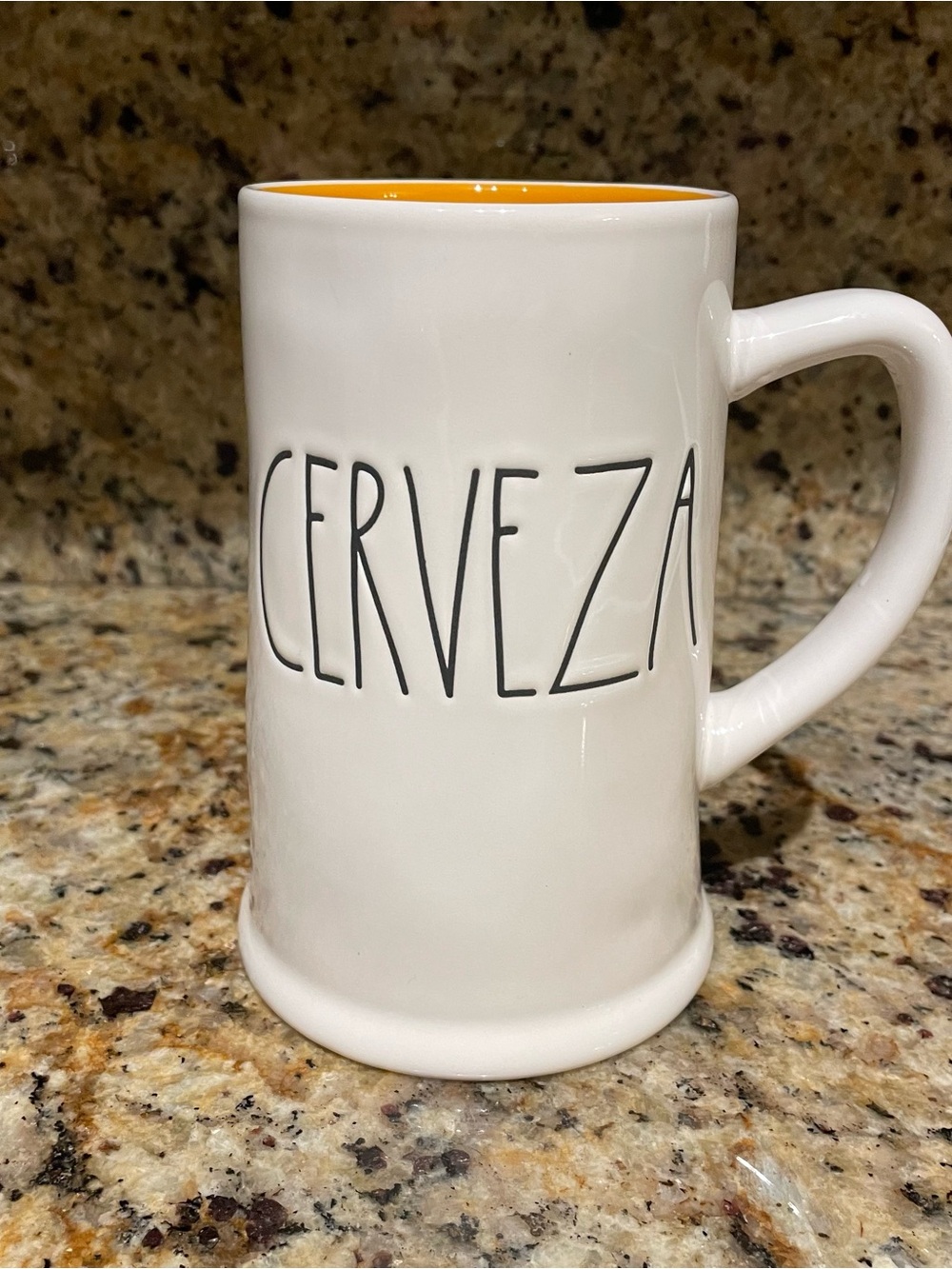 Rae Dunn White Ceramic stein with orange Interior -